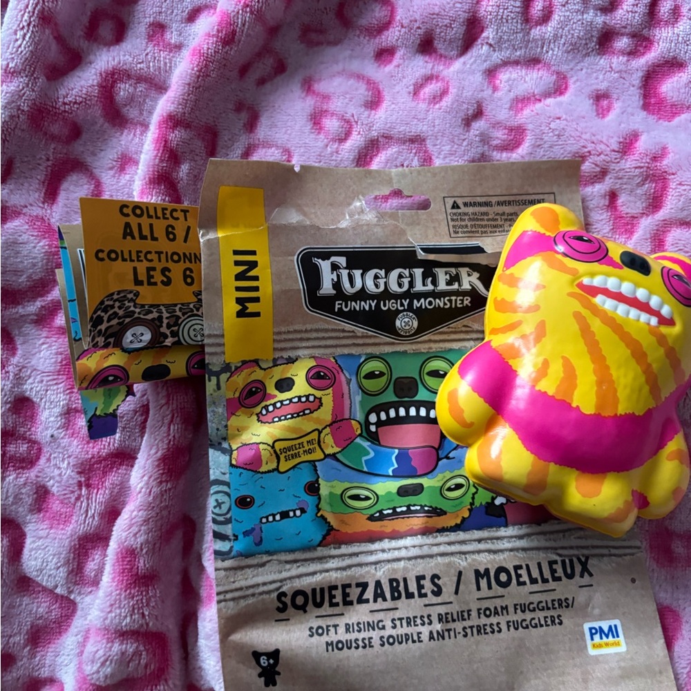 Mini Squeezable fuggler Toy - Yellow and Pink